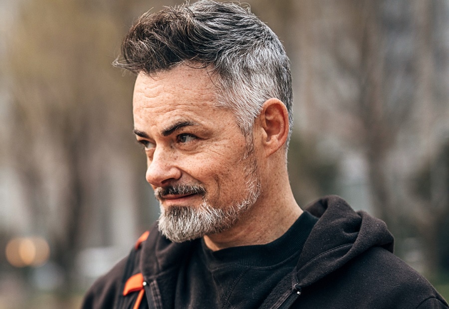 short and pepper hairstyle with gray beard