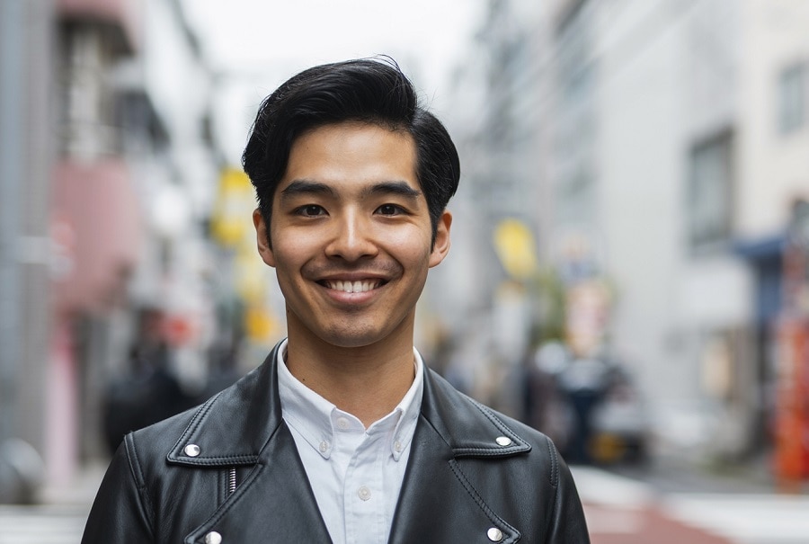 Asian guy with side part hair