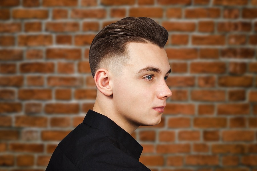 widows peak hairstyle with bald fade