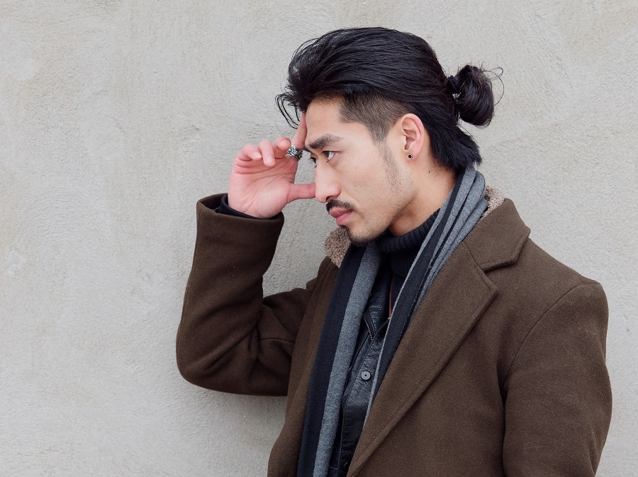 Asian guy with long hair and topknot