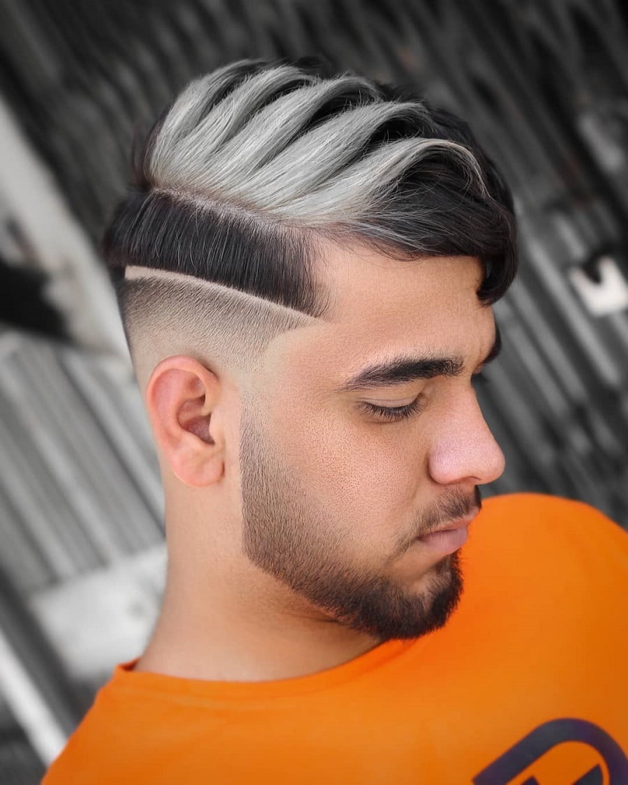 bald fade haircut with silver highlights