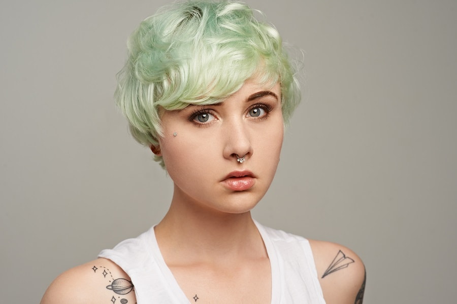 girl with pastel green short hair