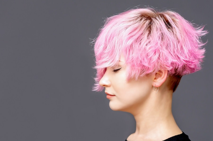 messy shaggy hairstyle with short pink hair
