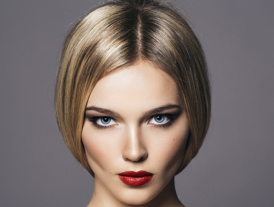 sleek and short blonde bob with straight hair