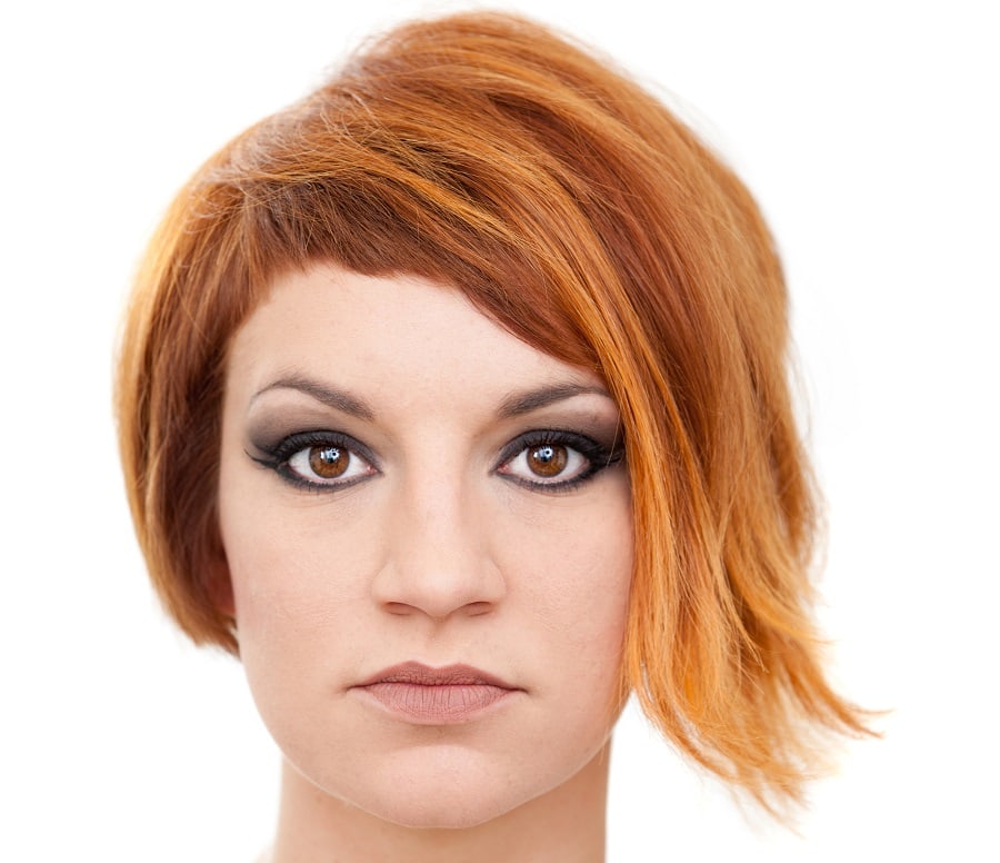 asymmetrical short red hairstyle