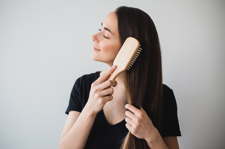 brush less to get healthy hair