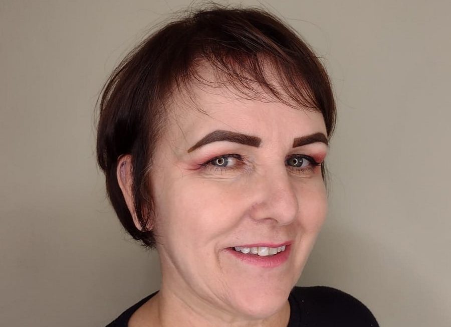 messy pixie with bangs for woman over 50