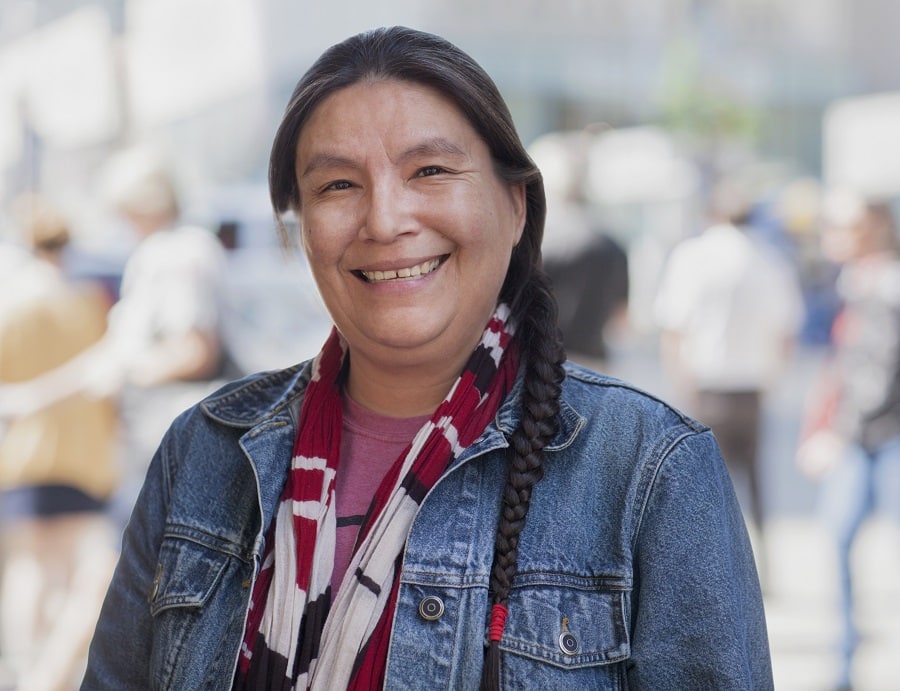 woman over 50 with long braid