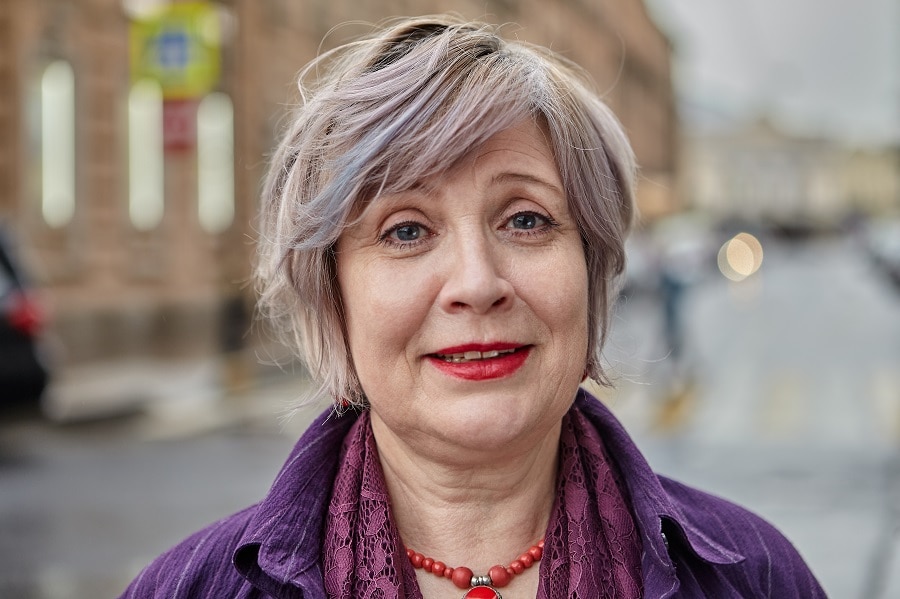 messy silver grey bob for women over 50