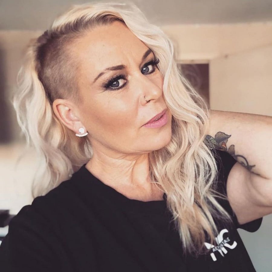 woman over 50 with blonde edgy hairstyle