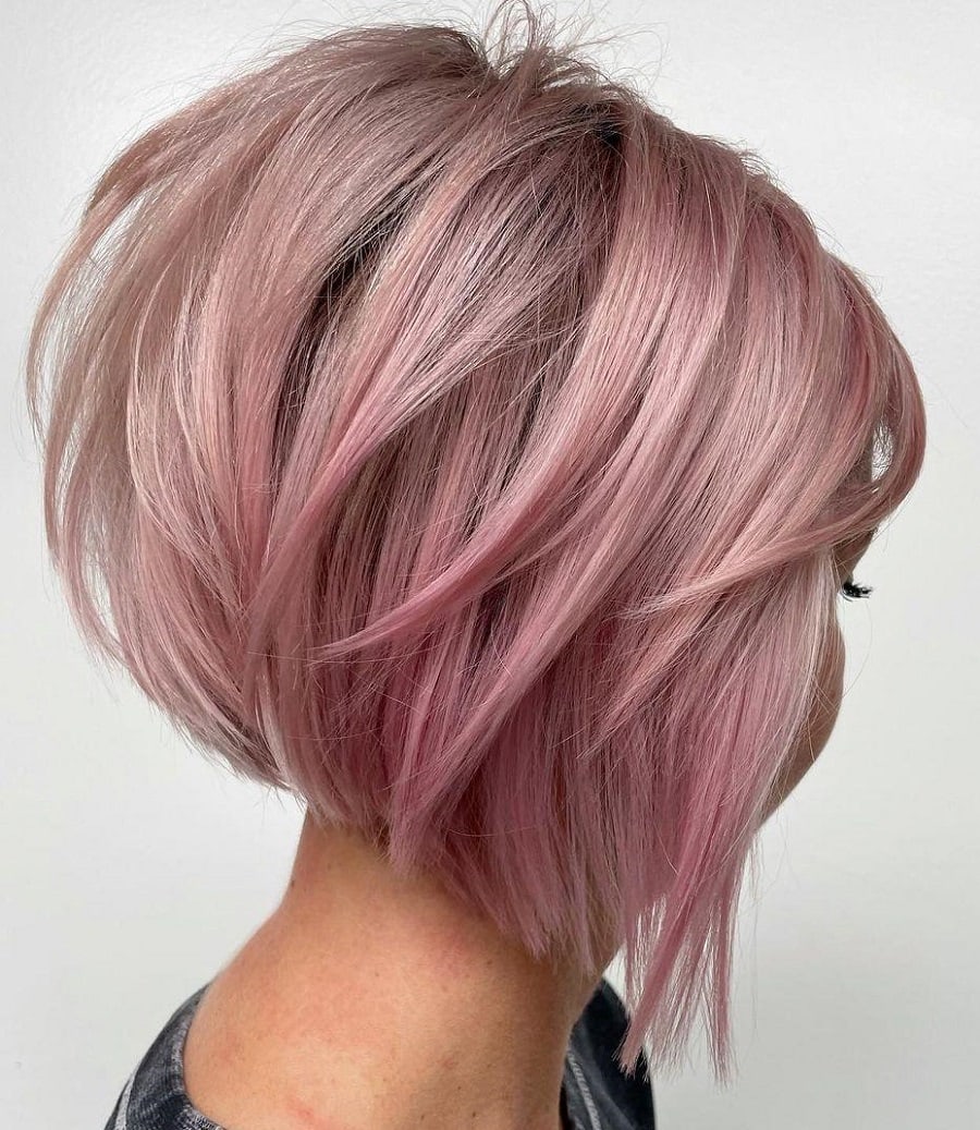 inverted bob with pastel pink hair