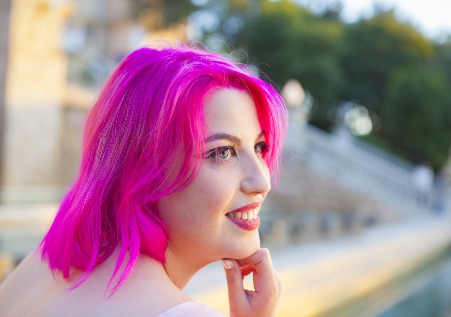 layered bob with dark pink hair