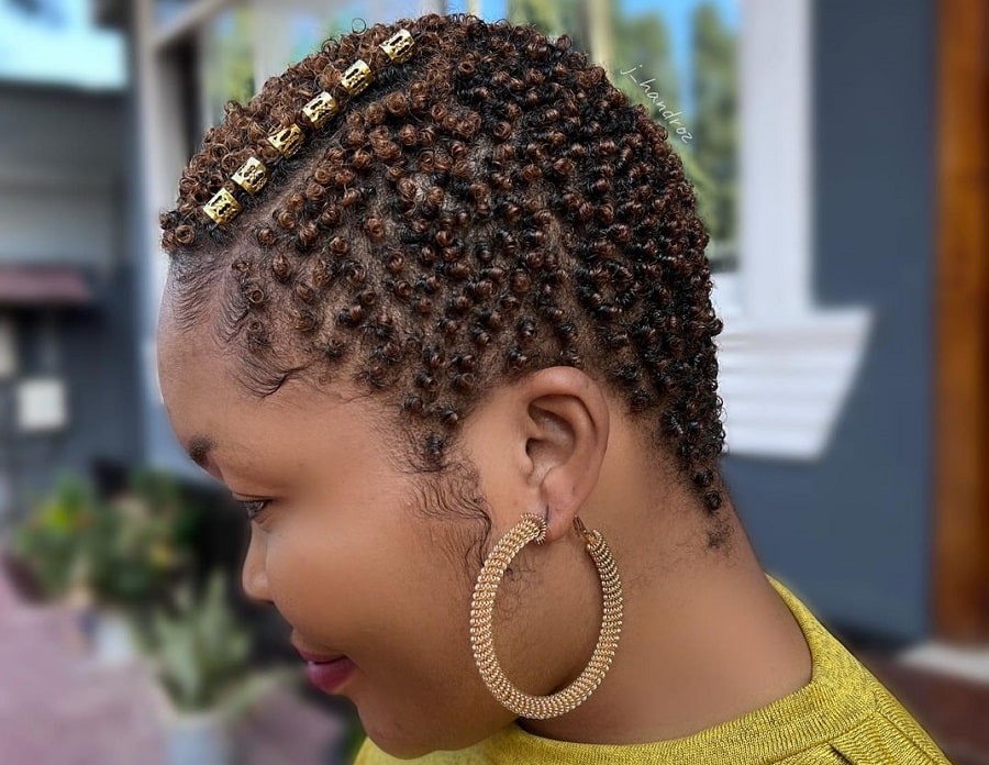 coils hairstyle with beads