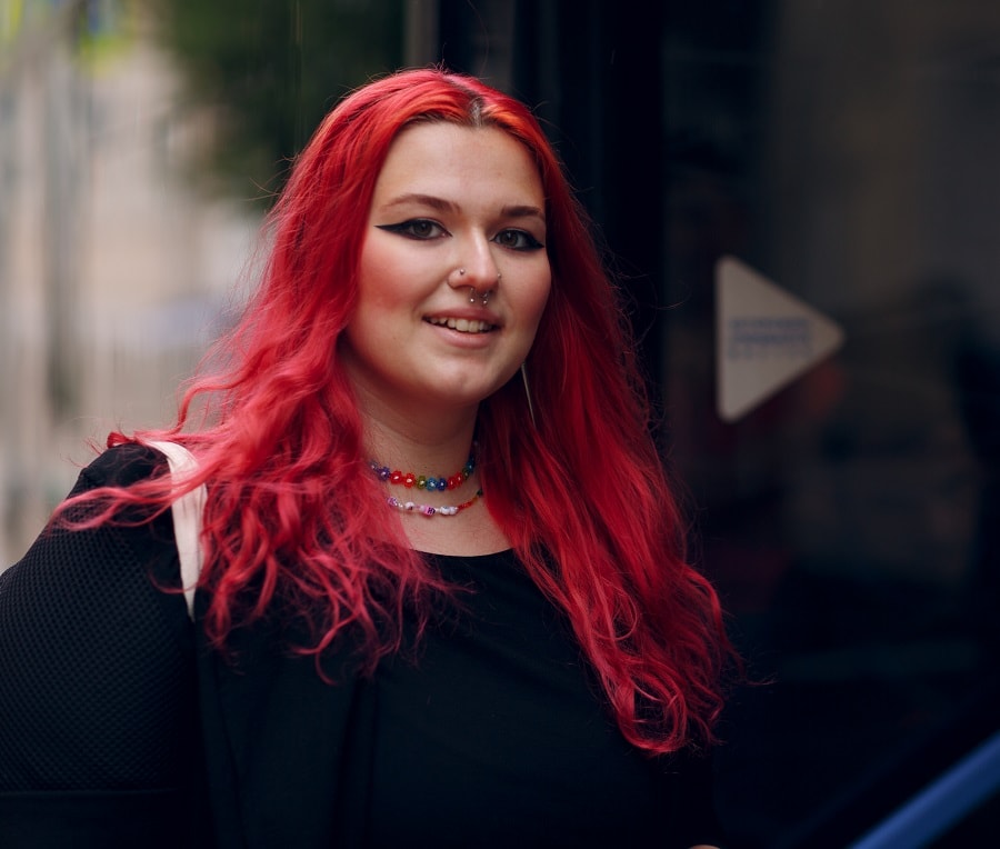 fat face woman with long red hair