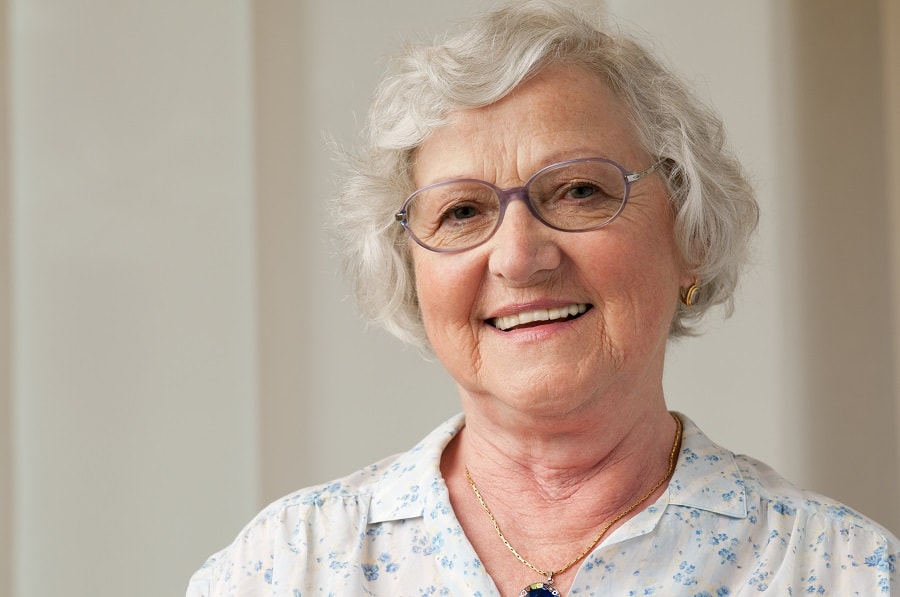 woman over 60 with short wavy bob