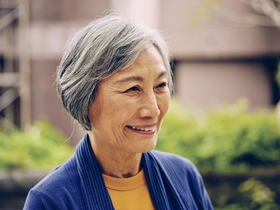 Asian older woman with short gray bob