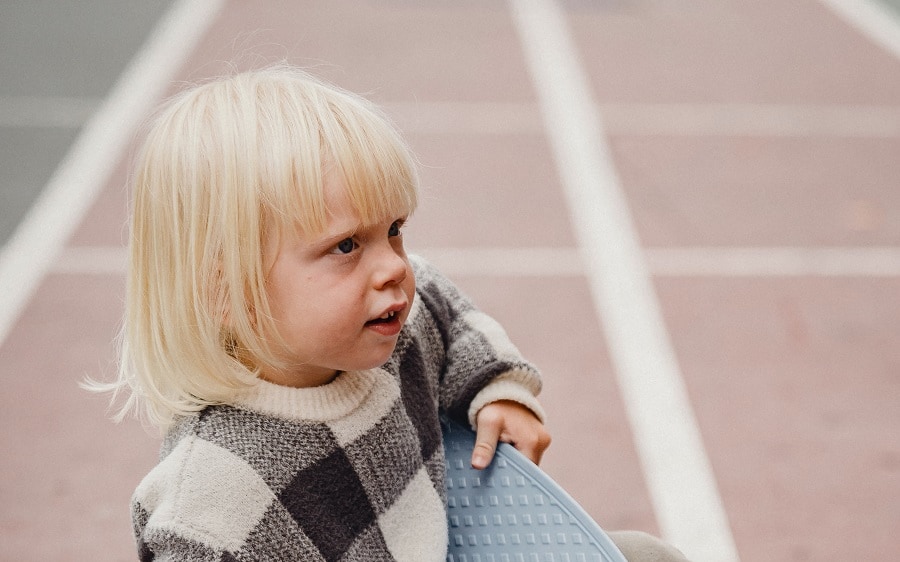 cute little boy with blonde hair and bangs