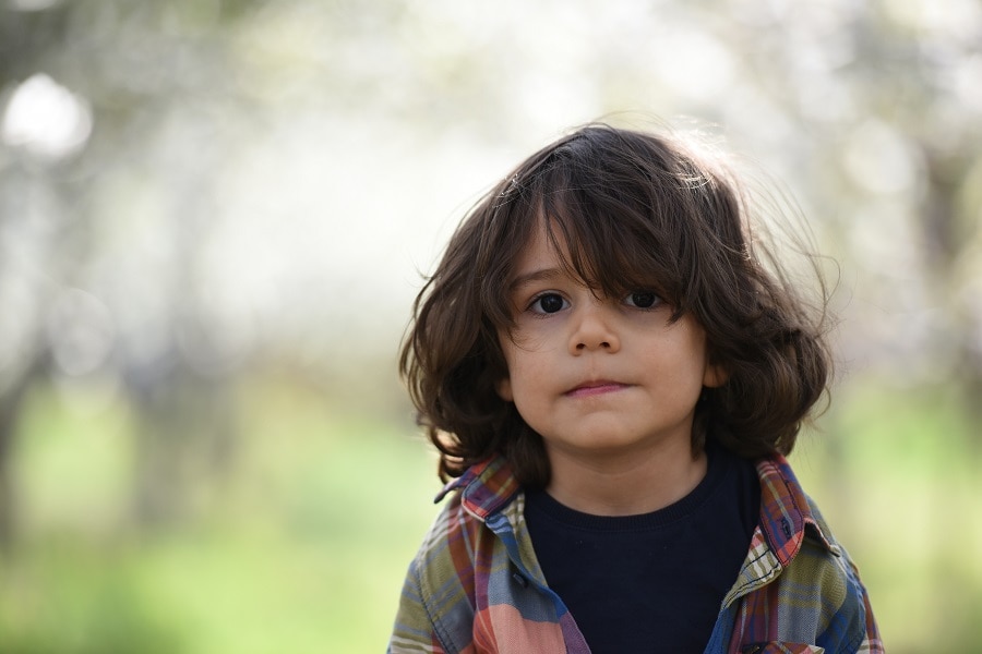 long messy hairstyle for little boys