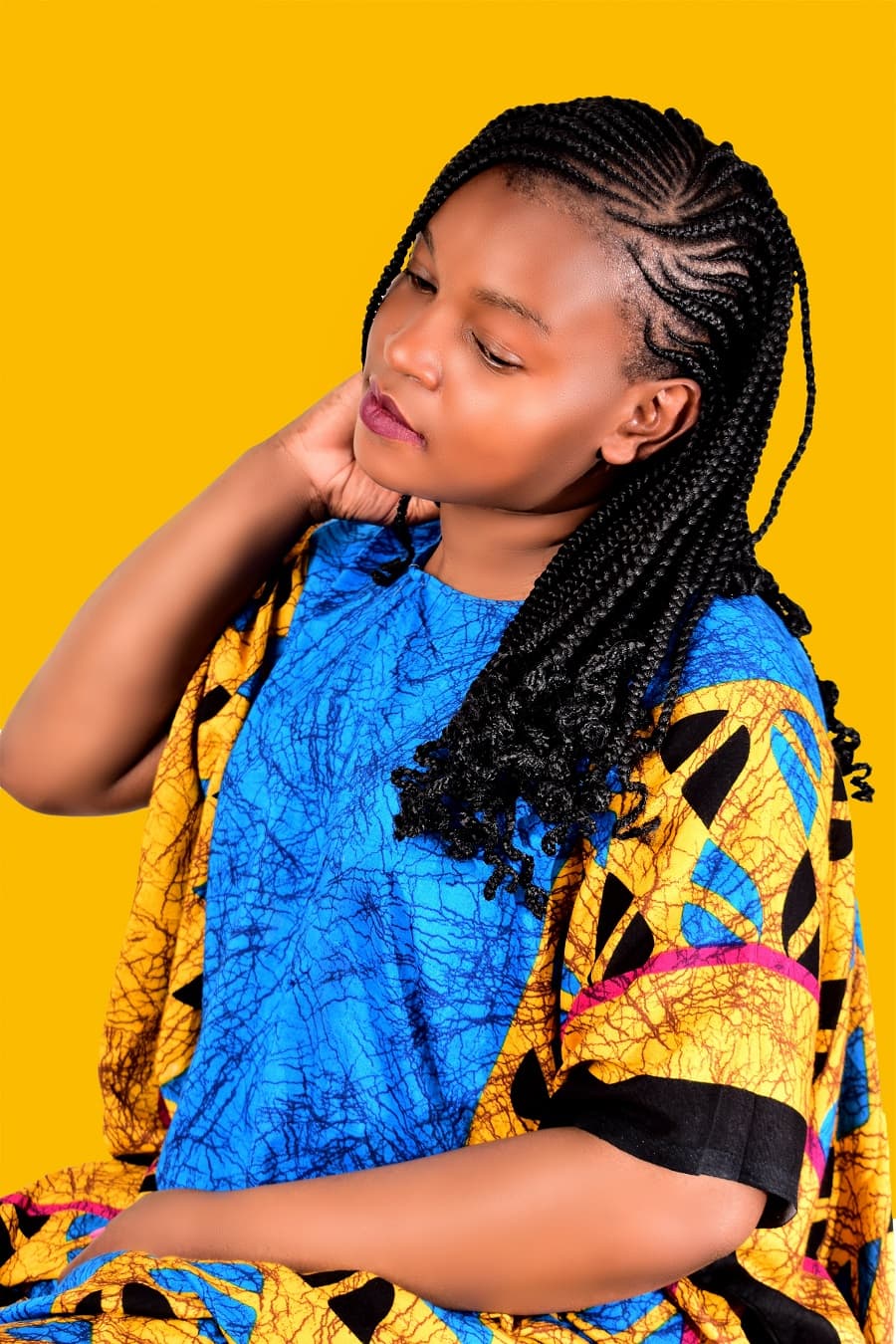 black girl with lemonade braids