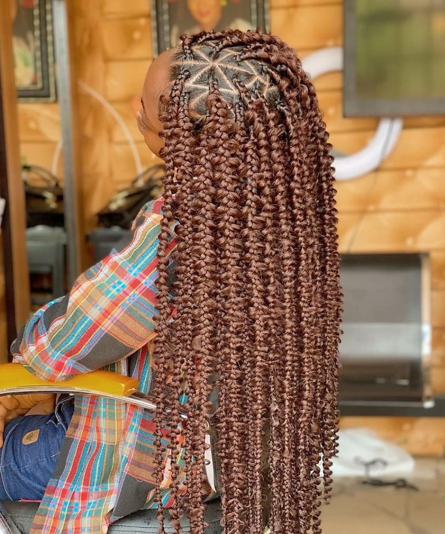 black woman with butterfly braids