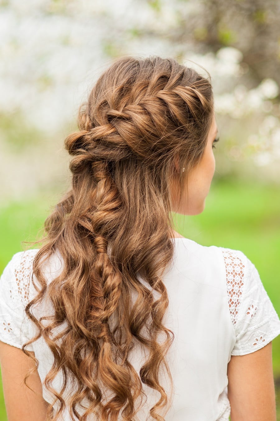 half up half down hairstyle with mermaid braids