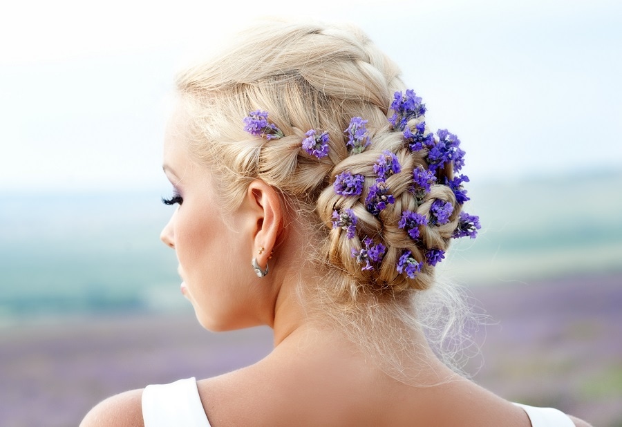 wedding bun with braids and flowers
