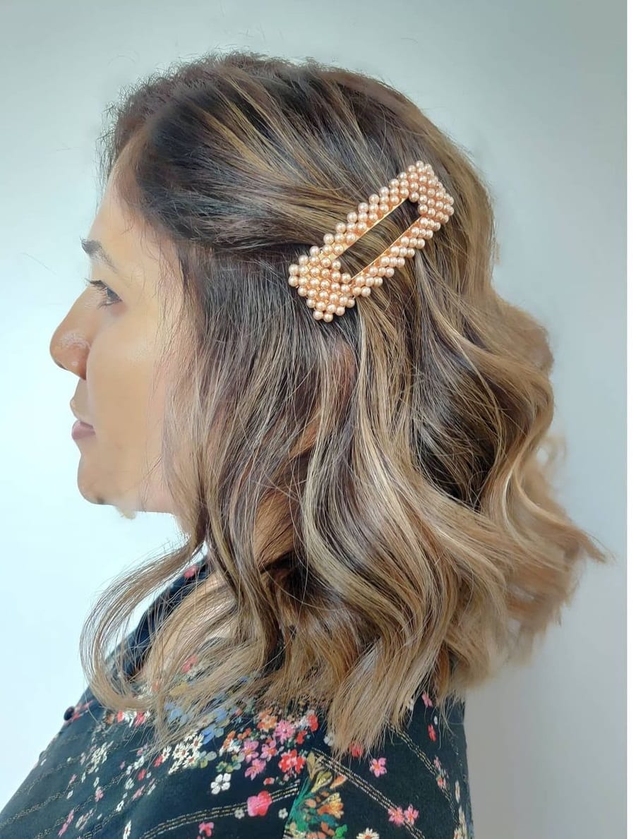 wavy hair with sandy brown highlights