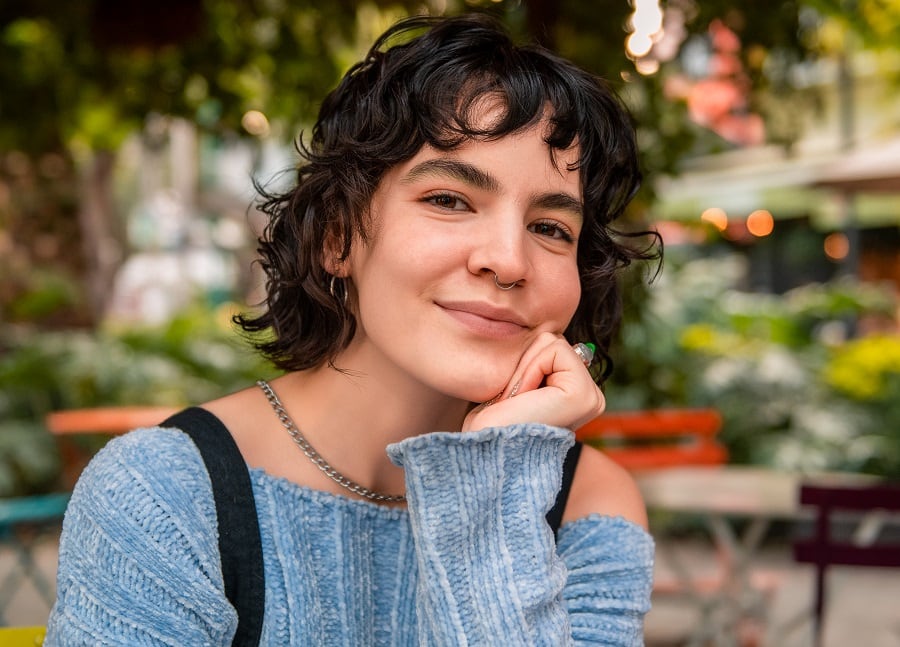 woman with short curly hairstyle