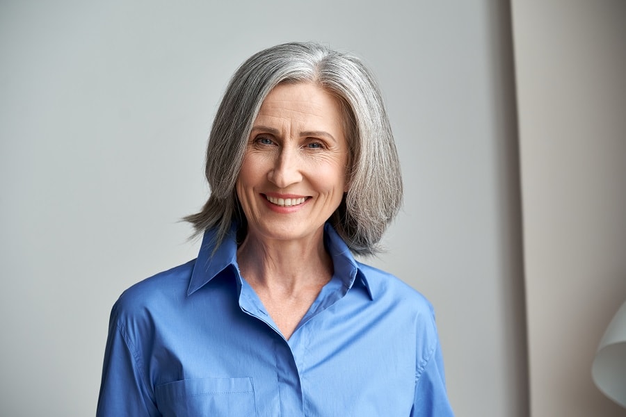 medium grey bob with thick hair for older woman