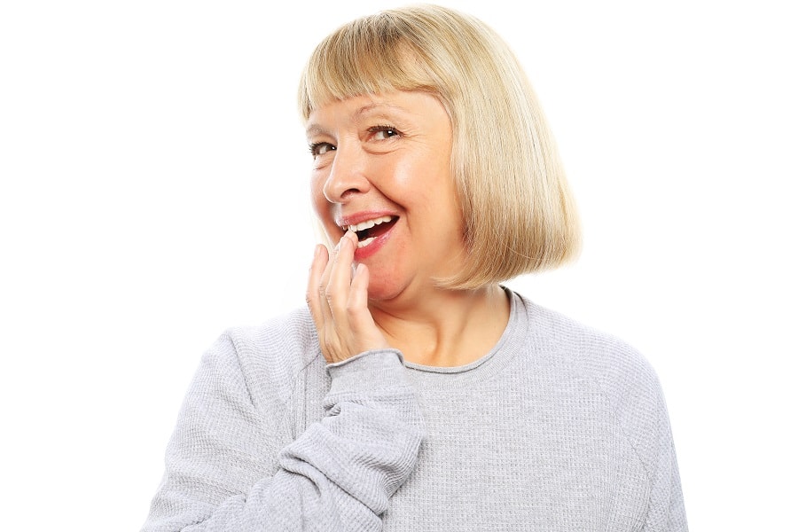 woman over 50 with bob cut and bangs