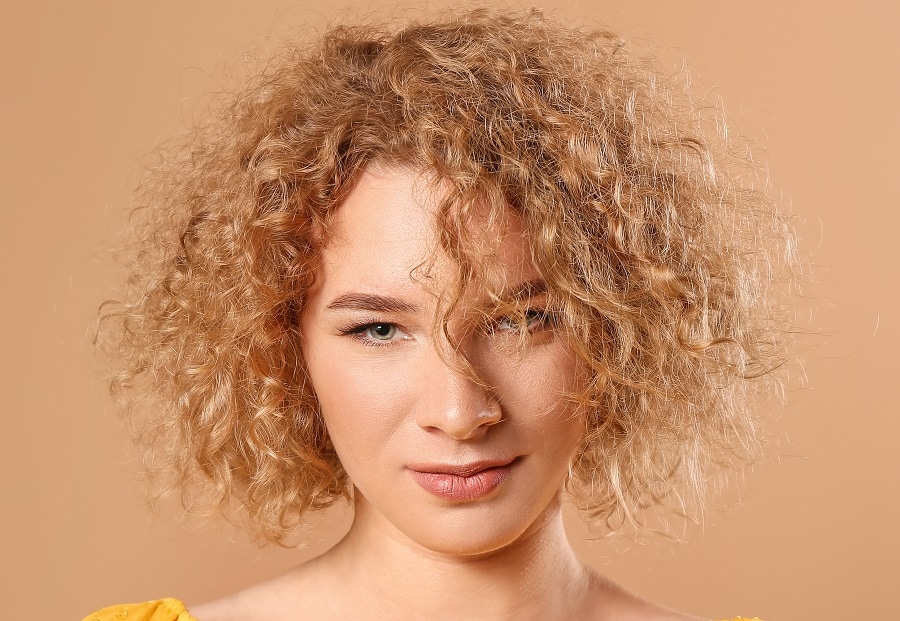 woman with frizzy blonde curls