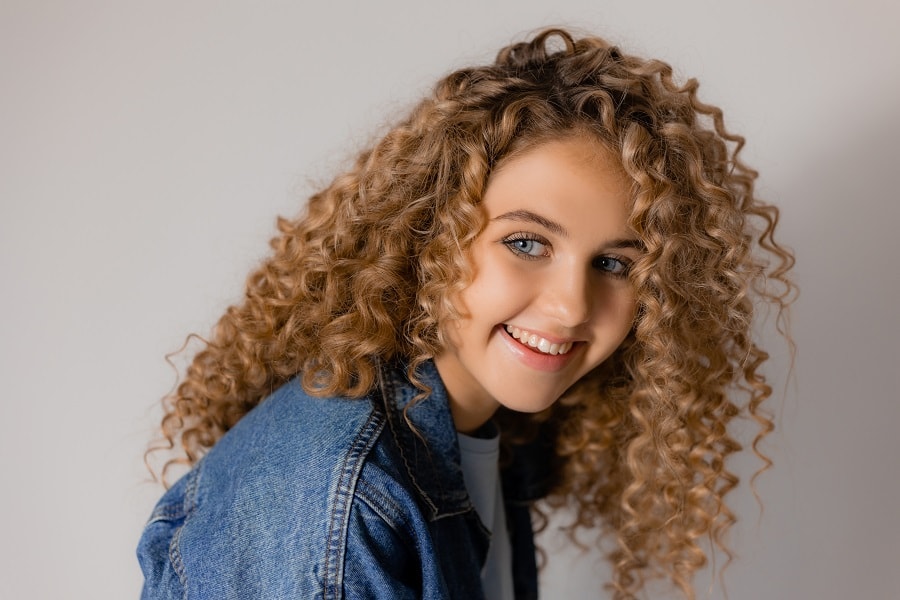 tight blonde curls hairstyle