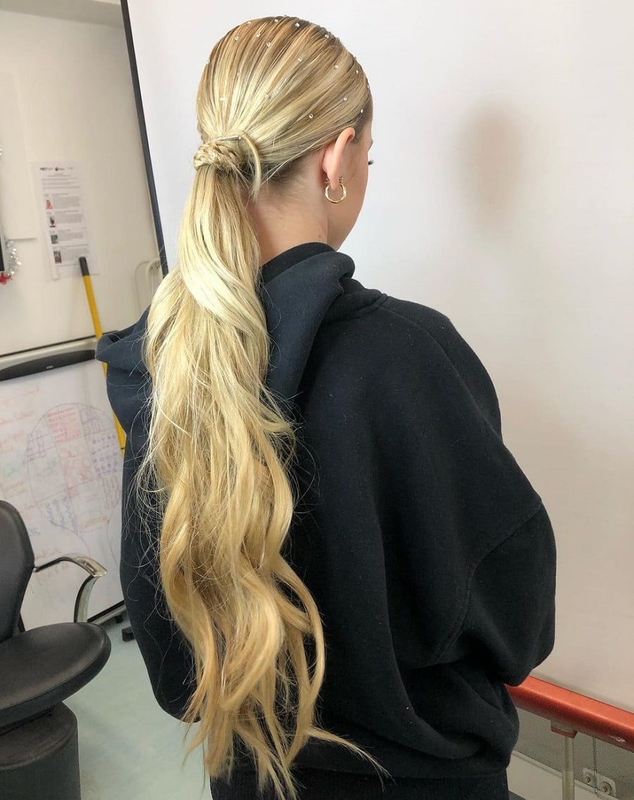 long ponytail with blonde wavy hair