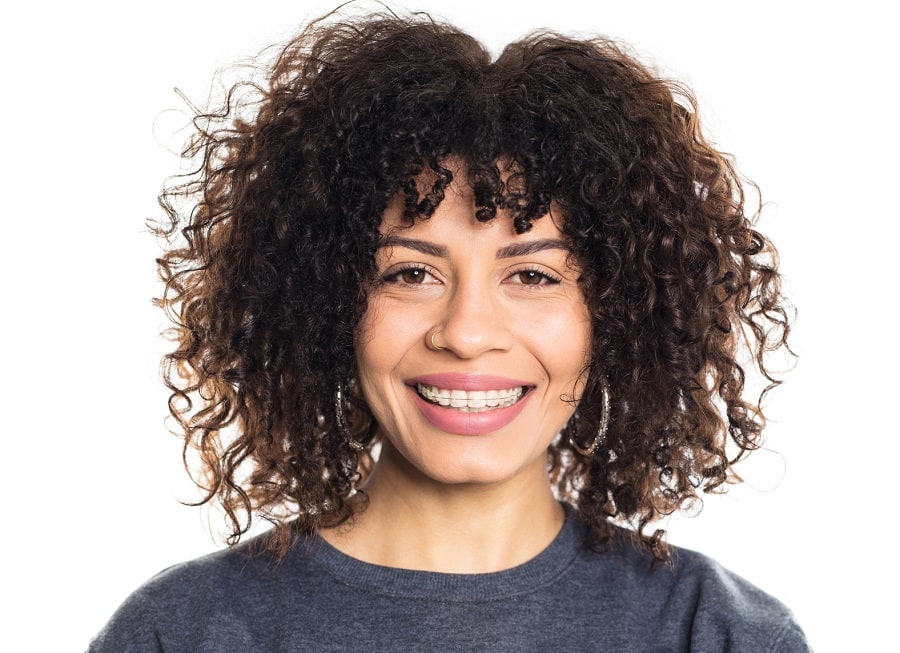 curly messy bob with bangs