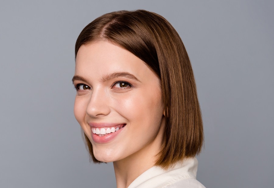 sleek brunette bob with middle part