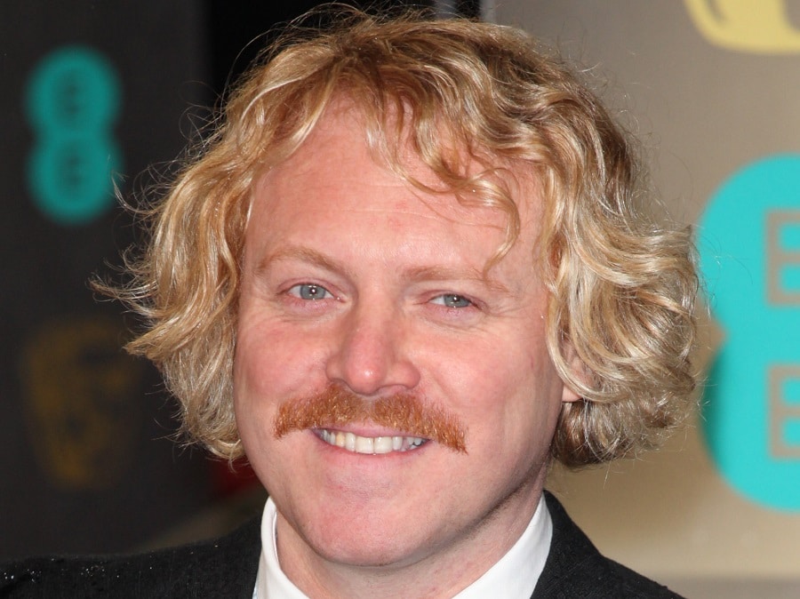 Blonde Actor Leigh Francis with Curly Hairstyle
