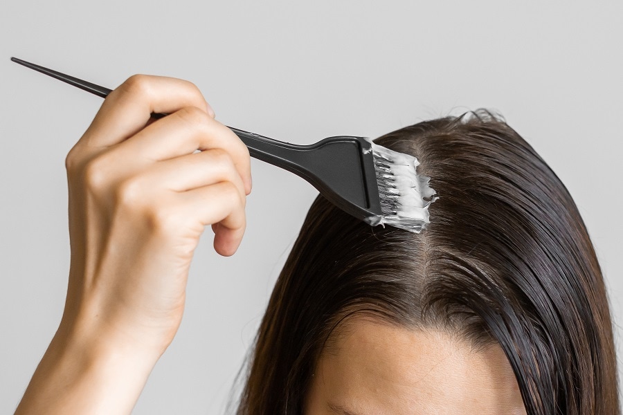 applying the mixture to get white hair naturally