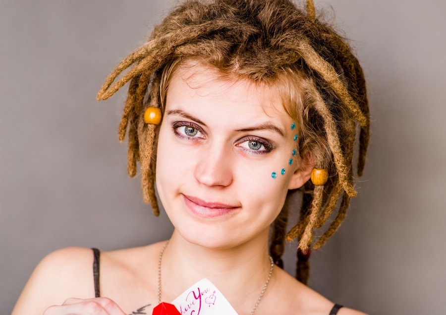 blonde dreads with beads