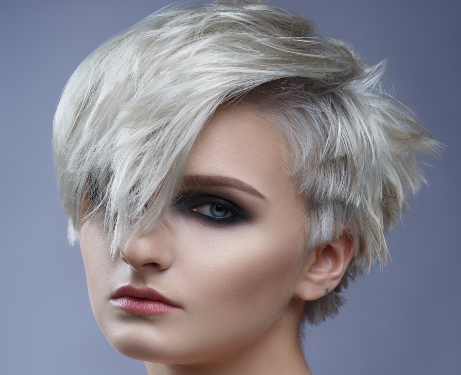 woman with blonde pixie bob and side bangs