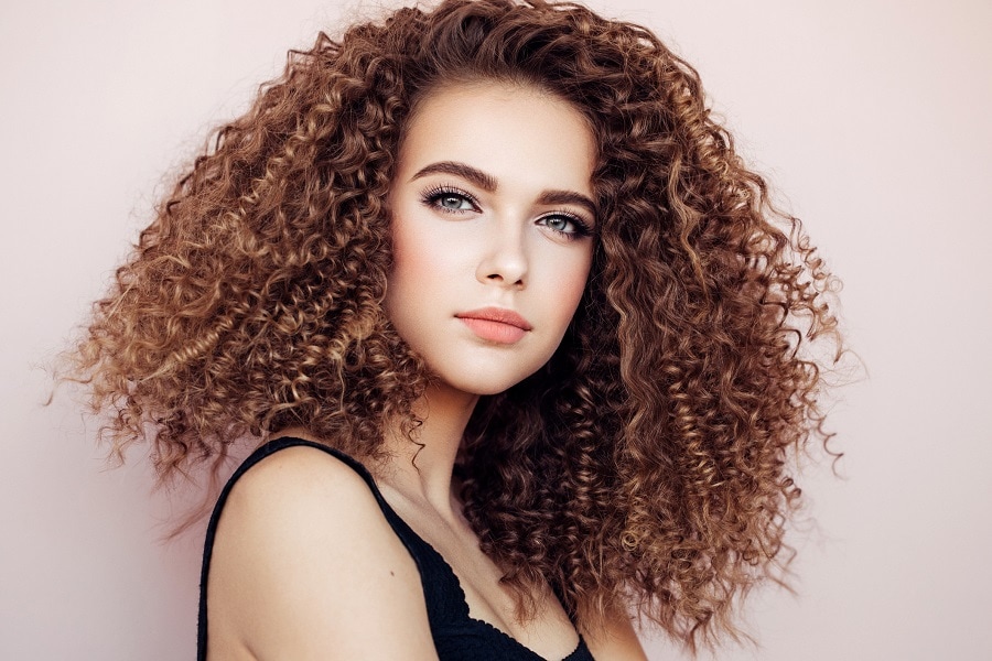 blue eyed women with curly brown hair