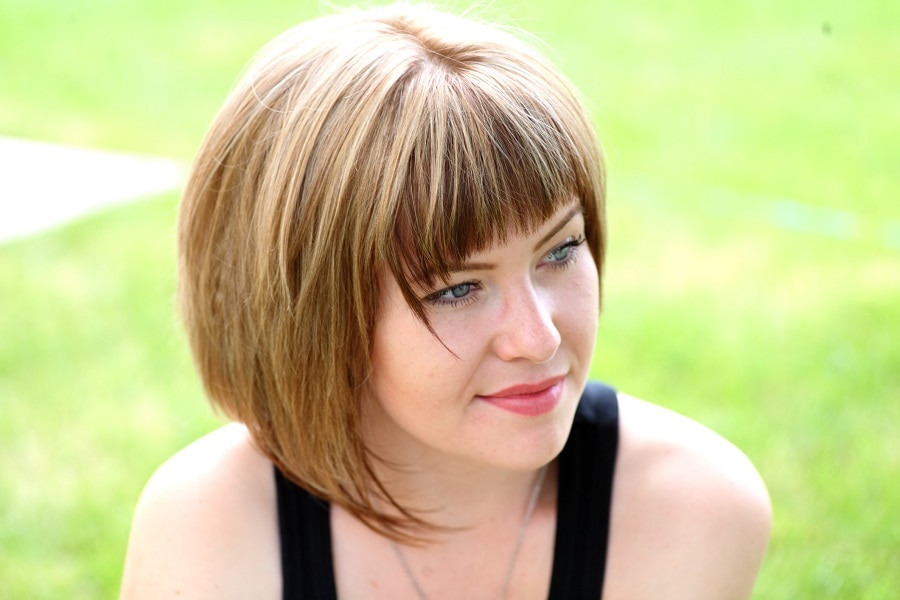 brown bob with bangs for blue eyes and fair skin