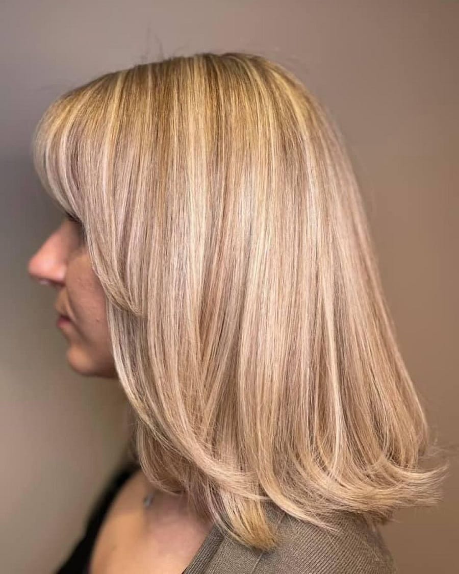 champagne blonde feathered hair