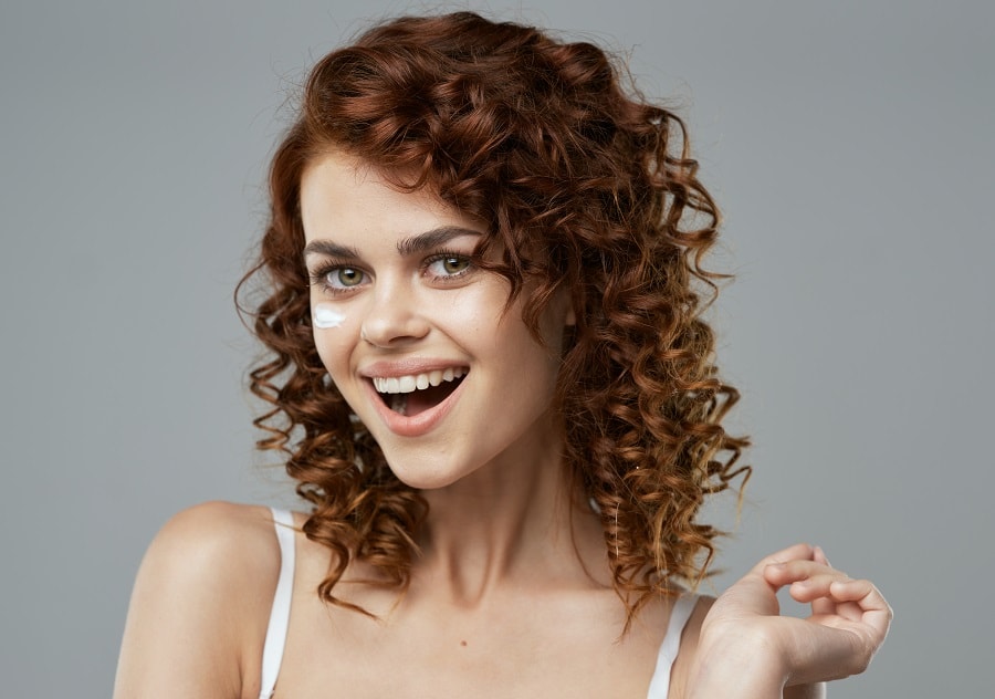 curly dark auburn red hair for olive skin