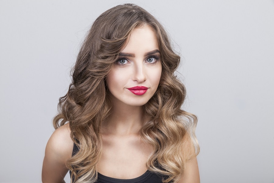 layered sandy brown wavy hair