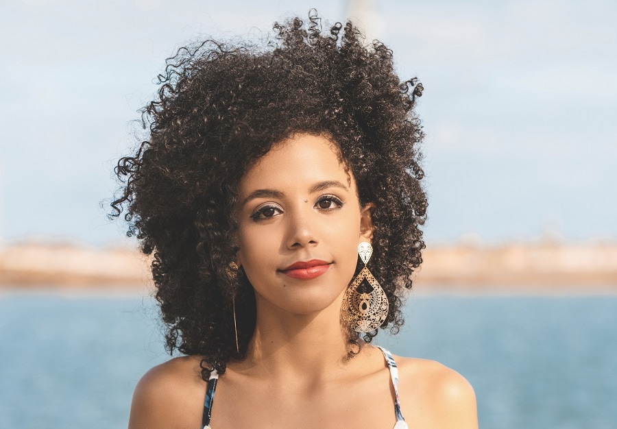 mixed girl with curly afro hair