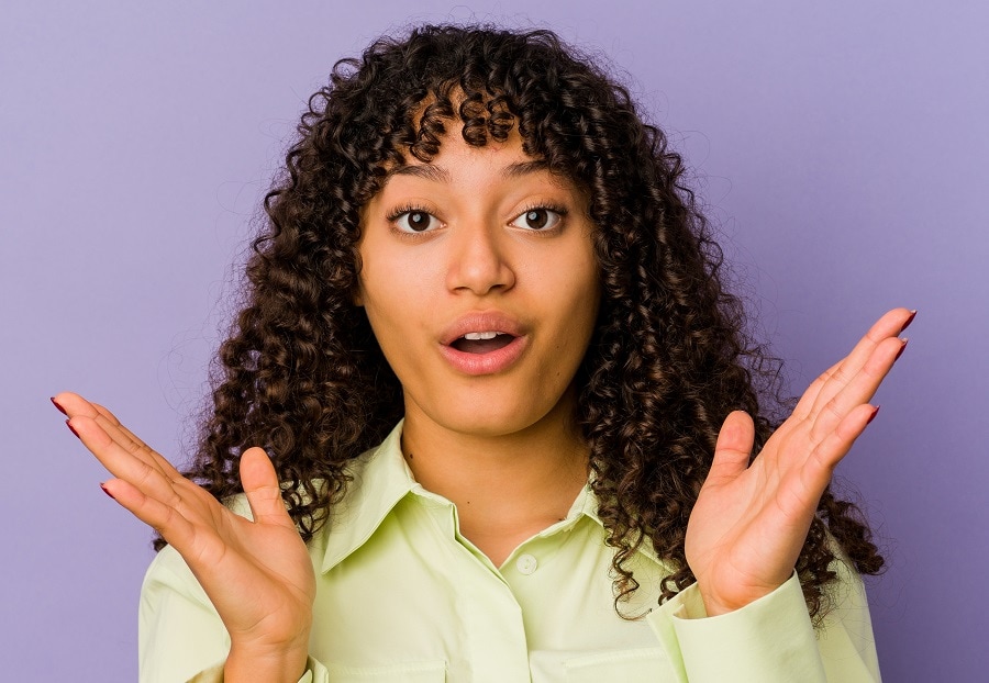 mixed girl with curly bangs