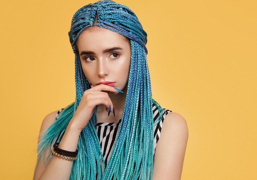 woman with pastel blue braids