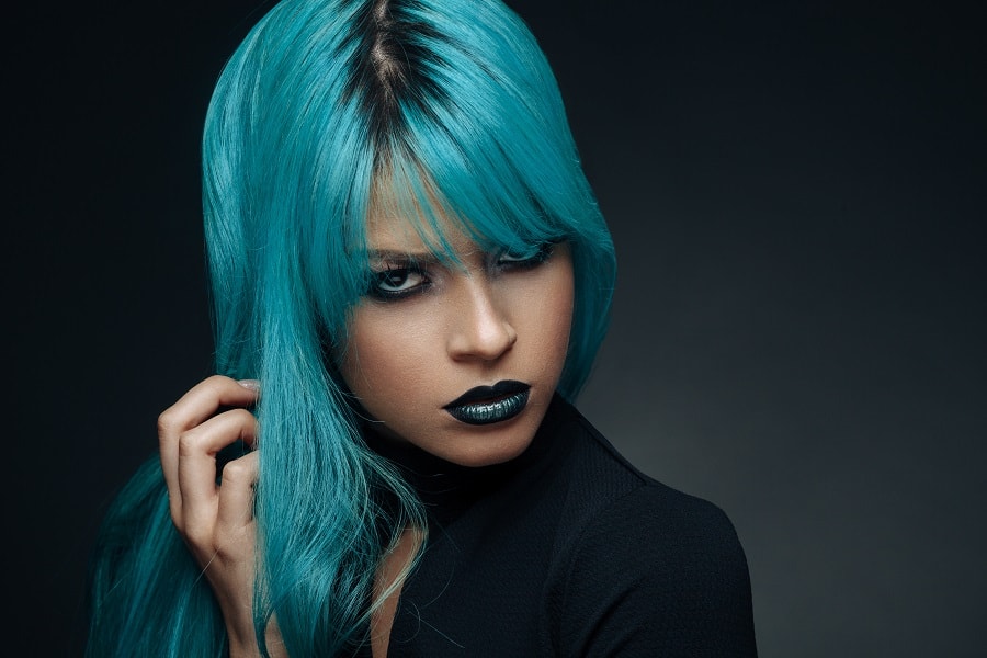 pastel blue hair with dark roots