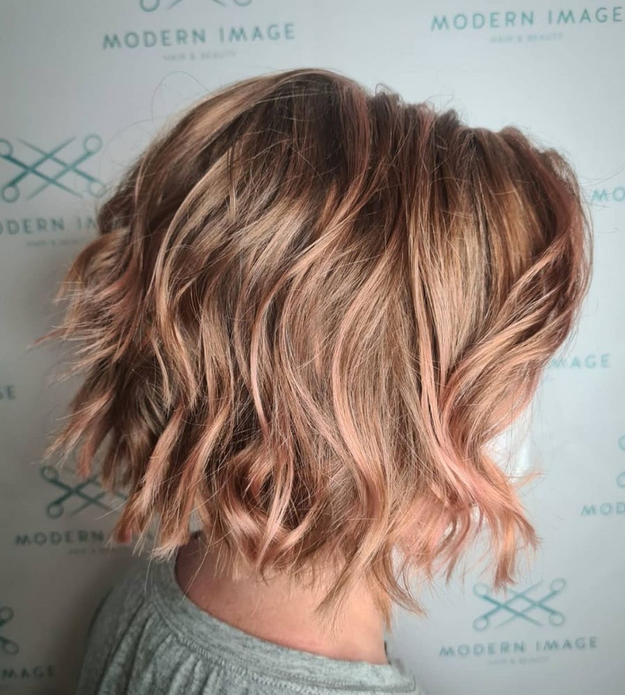 shaggy balayage bob with rose gold highlights