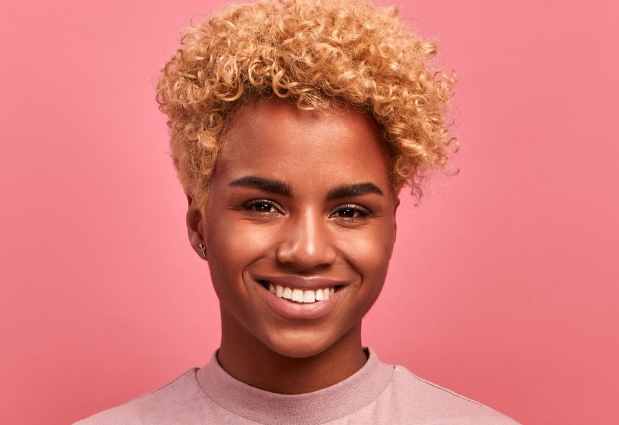 black girl with short curly blonde hair without bangs